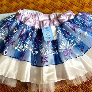 XS Dottie skirt 11 inches long. Brand new with tags